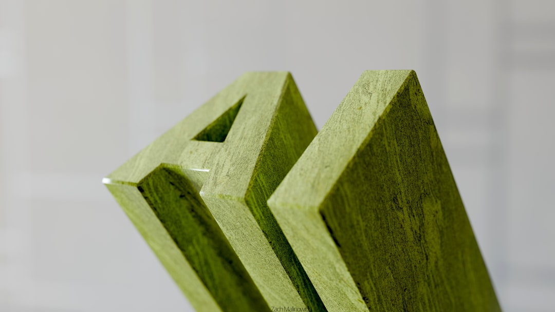 GPT-5.4 enterprise AI automation finance - Green wooden letters spelling out am