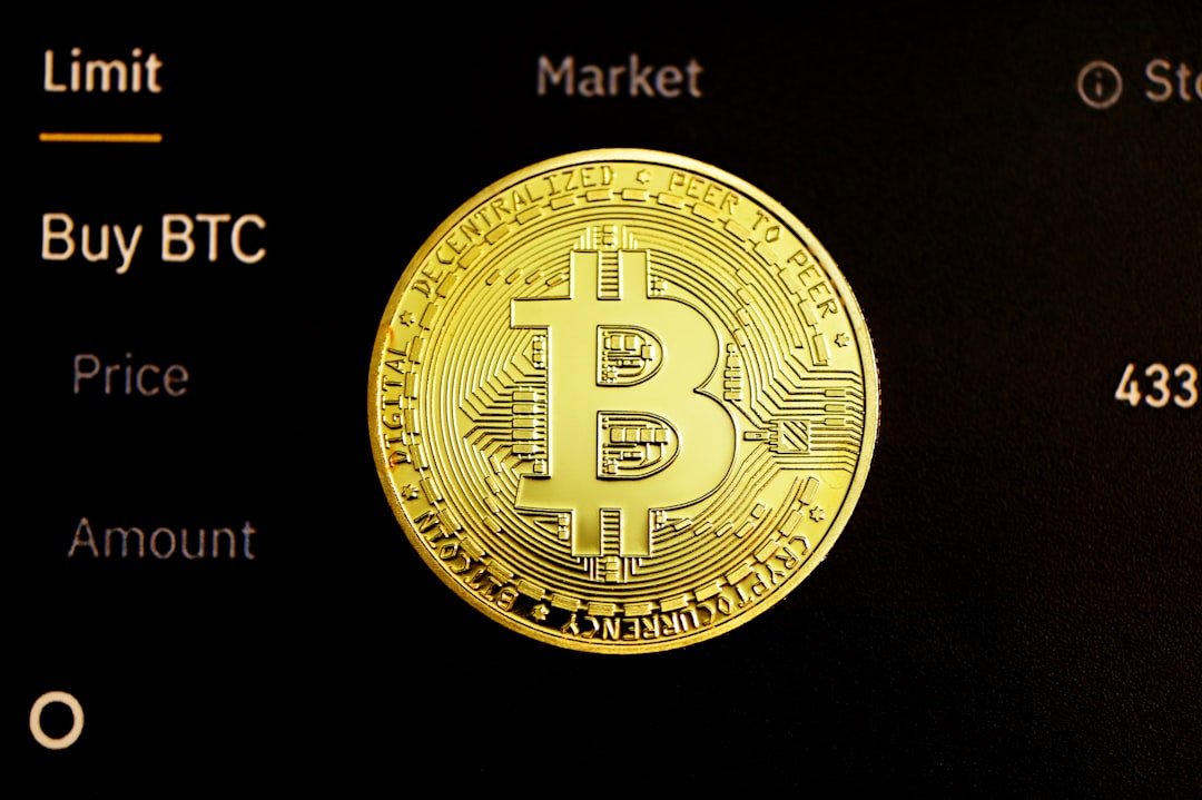 Bitcoin ETF - gold round coin on black surface