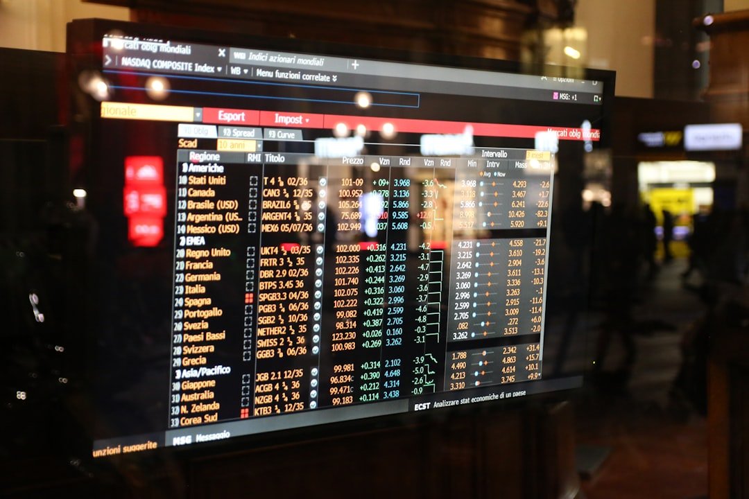 Ethereum price chart volatility - Financial stock market data displayed on a screen.