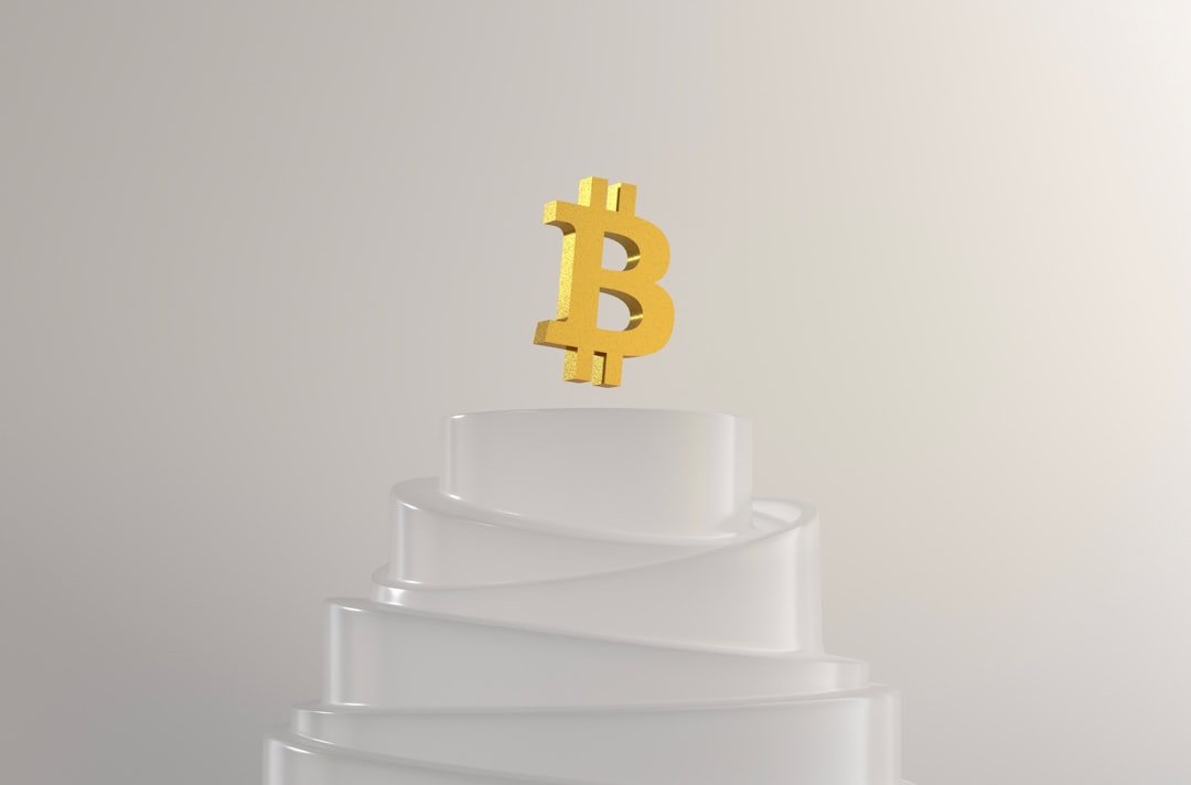 X Money crypto trading - a gold crown on a stack of white paper