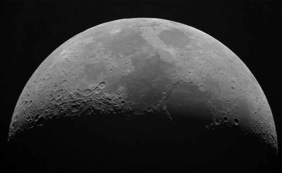 Close-up of the lunar surface showing crater formations similar to the Artemis II observation targets