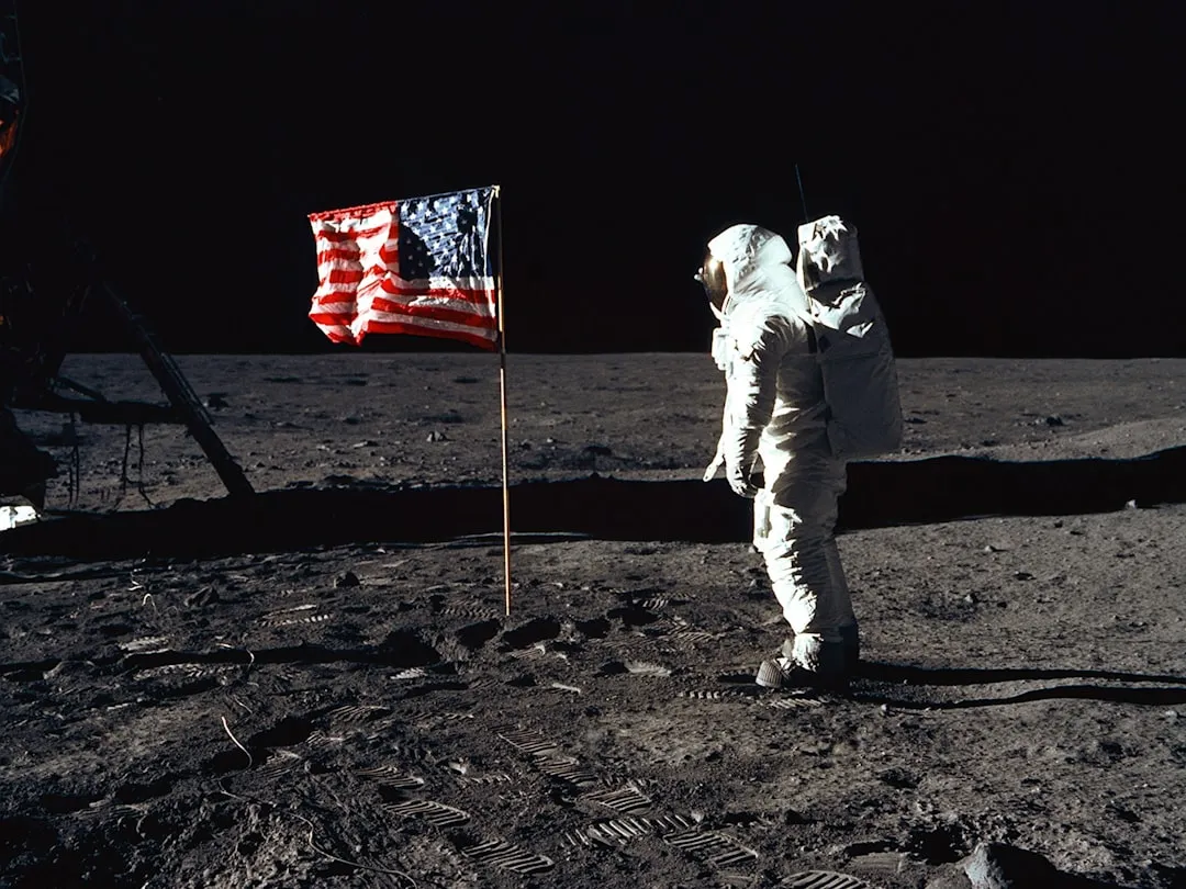 Apollo-era astronaut on the lunar surface, symbolizing the 53-year gap before Artemis II