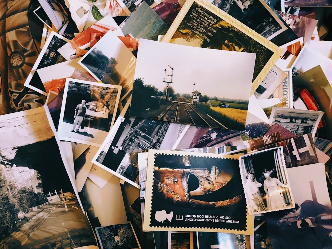 A pile of old photographs representing memory